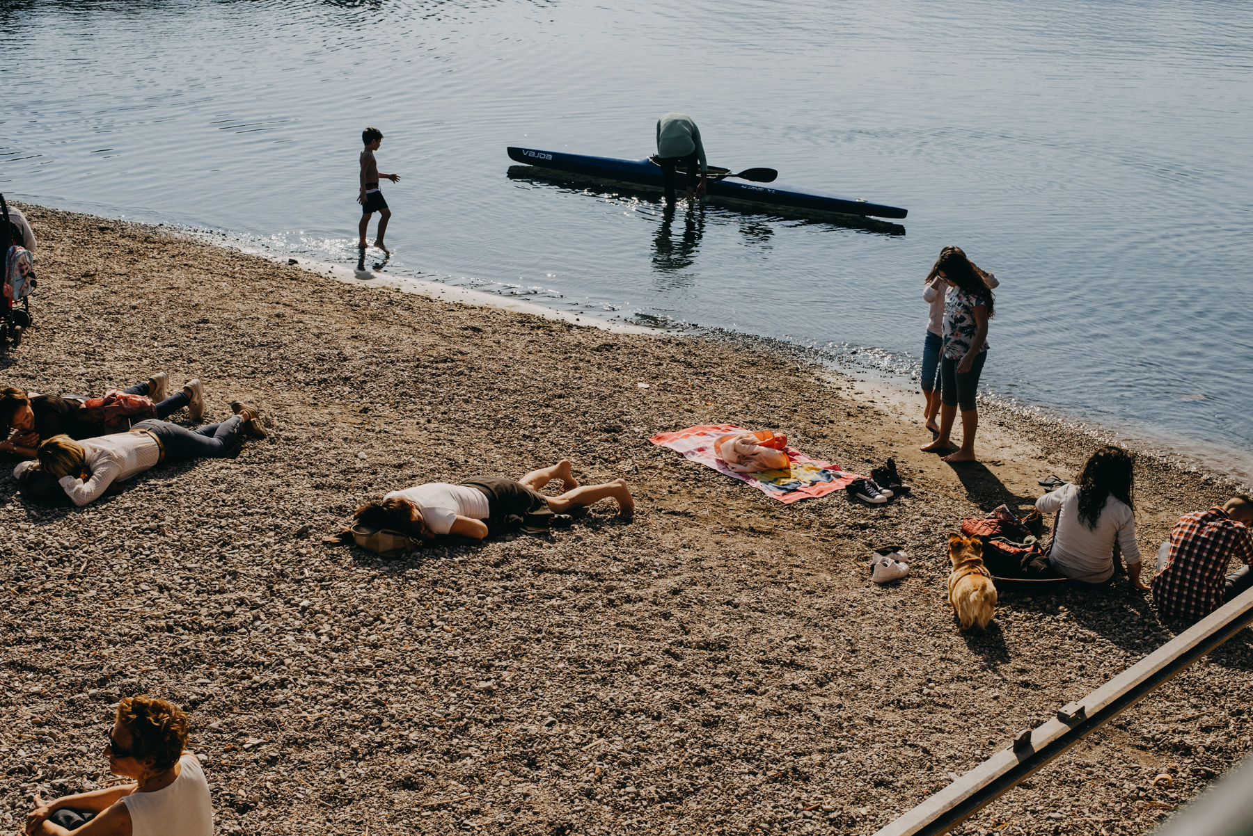 street photography showing people on the beach in the city of Salerno